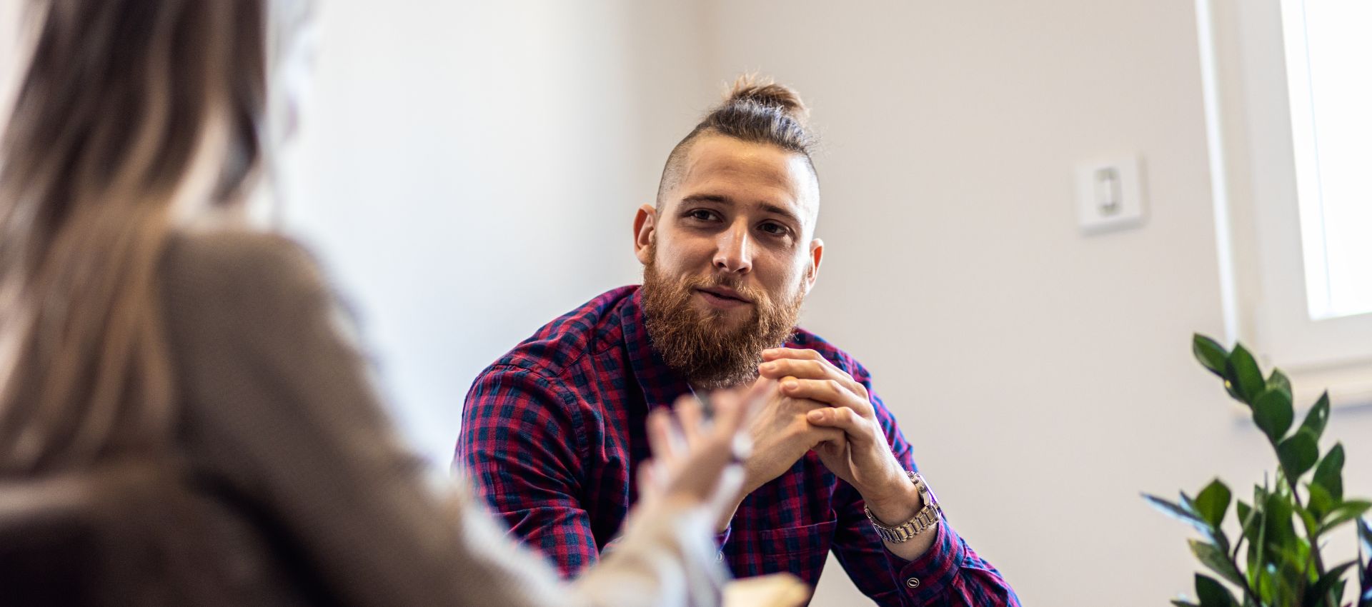 Man giving feedback in a meeting